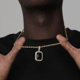 ONYX AND GOLD GEM PENDANT