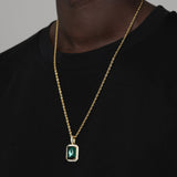 EMERALD AND GOLD GEM PENDANT