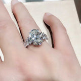 WOMENS MALVOS BRILLIANT OVAL CUT WITH MARQUISE SHAPE SIDE STONES RING - Malvos