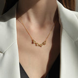 WOMENS MAGNETIC MICRO FOUR LEAD CLOVER NECKLACE [18K GOLD]