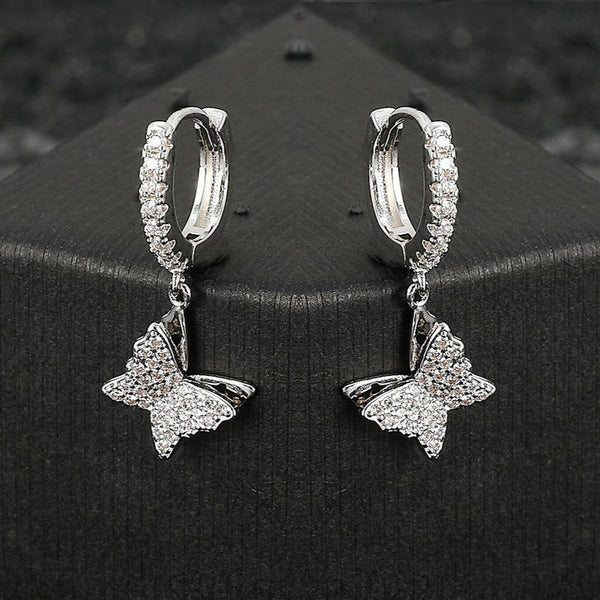 ICED BUTTERFLY DANGLE EARRINGS [18K WHITE GOLD)