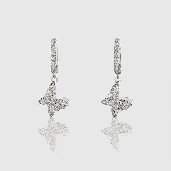 WOMENS ICED BUTTERFLY DANGLE EARRINGS [WHITE GOLD) - Malvos