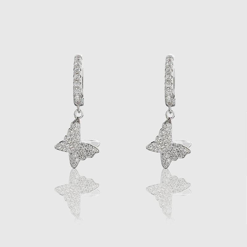 WOMENS ICED BUTTERFLY DANGLE EARRINGS [WHITE GOLD) - Malvos